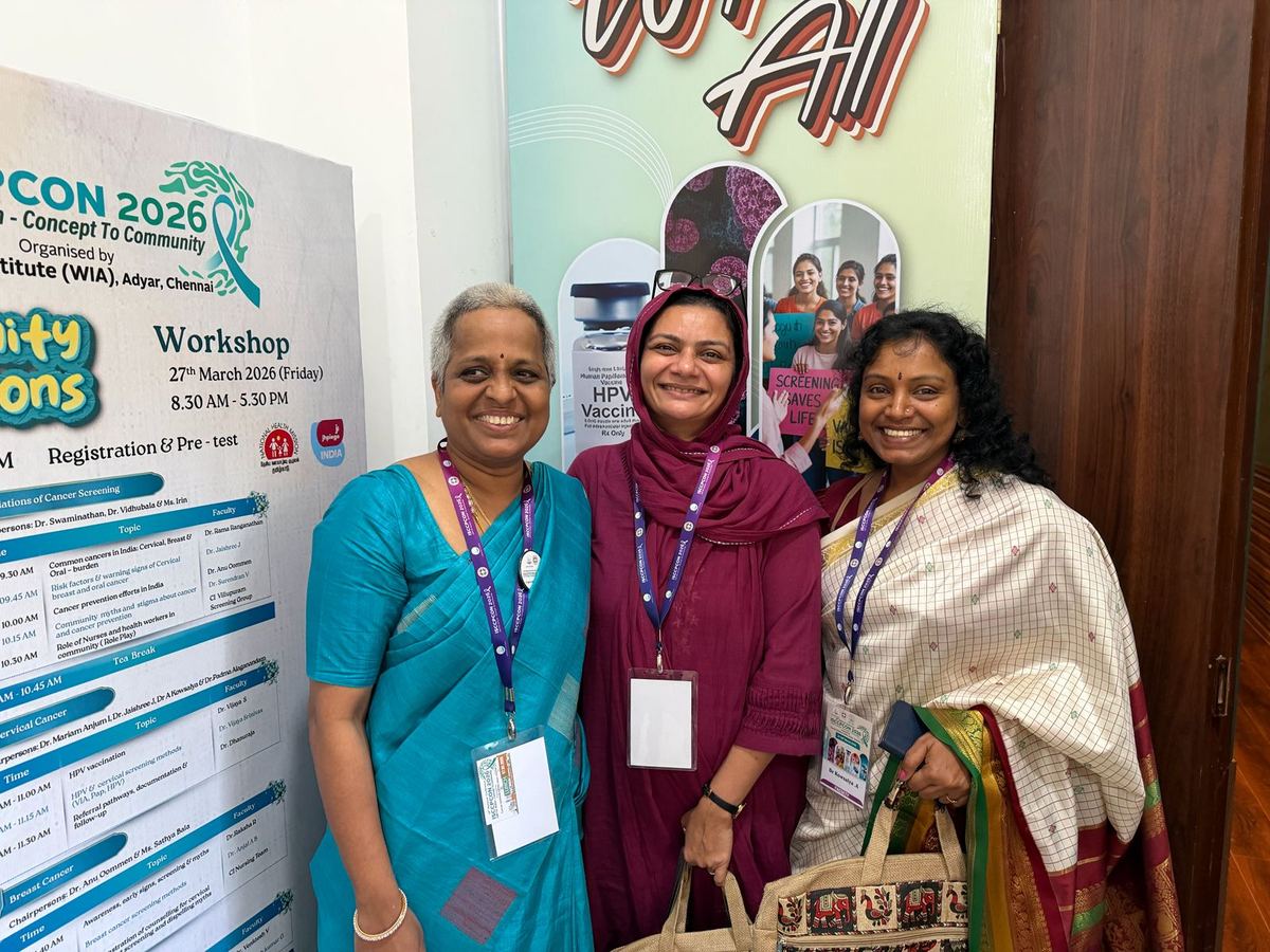 Dr. Mariam Anjum with colleagues at ISCCPCON 2026 workshop banner — Cancer Institute WIA, Chennai